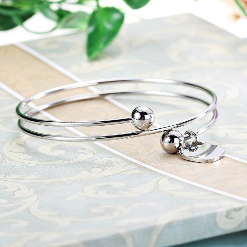 PULSERA ACERO ESPIRAL CON BOLAS Y CORAZÓN PARA GRABAR