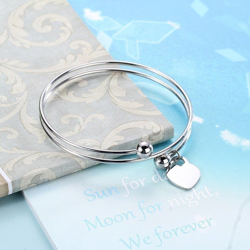 PULSERA ACERO ESPIRAL CON BOLAS Y CORAZÓN PARA GRABAR