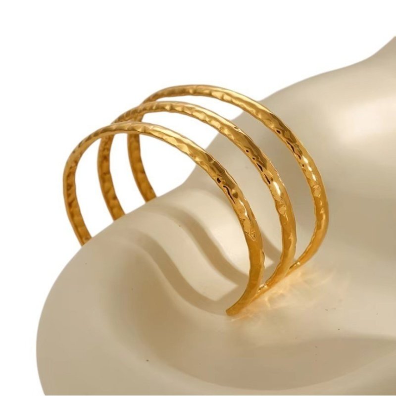 BRAZALETE TRIPLE MYKONOS ACERO Y ORO WATERPROOF