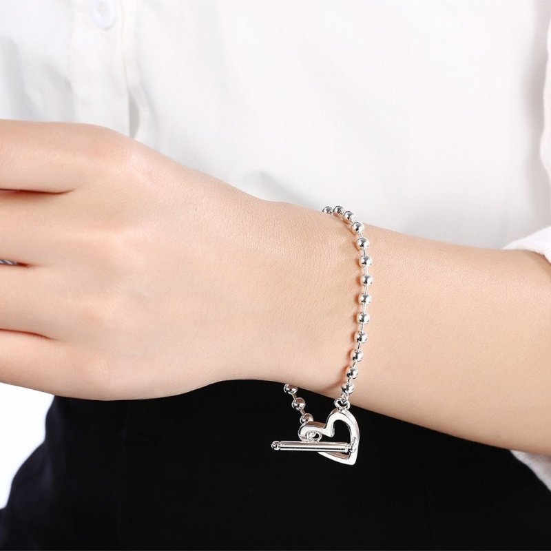 PULSERA BOLAS CORAZÓN PLATA