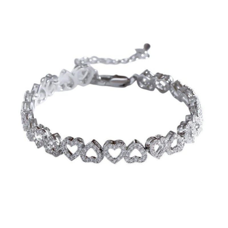 PULSERA TENIS CORAZONES CON ORO BLANCO