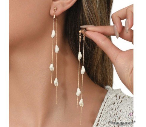 pendientes largos caracolas marinas acero y oro