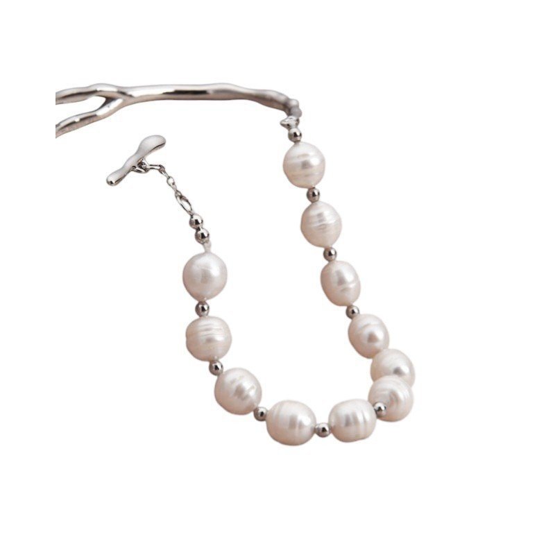 PULSERA SEMI RIGIDA PERLAS NATURALES ACERO INOX