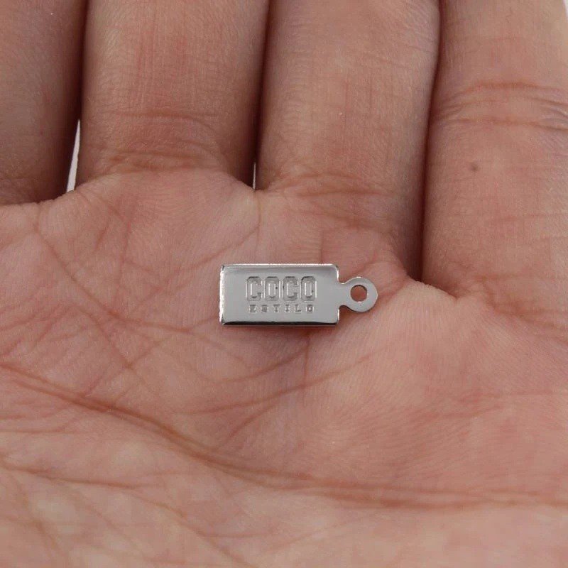 MINI ETIQUETAS PERSONALIZADAS LOGO TALLADO PARA JOYERÍA ACERO