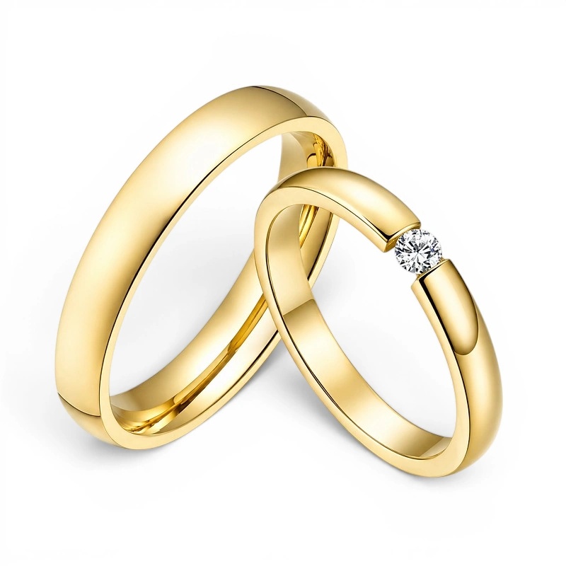 ALIANZAS ACERO Y TUNGSTENO CON ORO AMARILLO MODELO "AIRE"