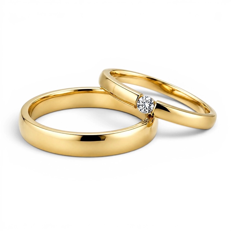 ALIANZAS ACERO Y TUNGSTENO CON ORO AMARILLO MODELO "AIRE"