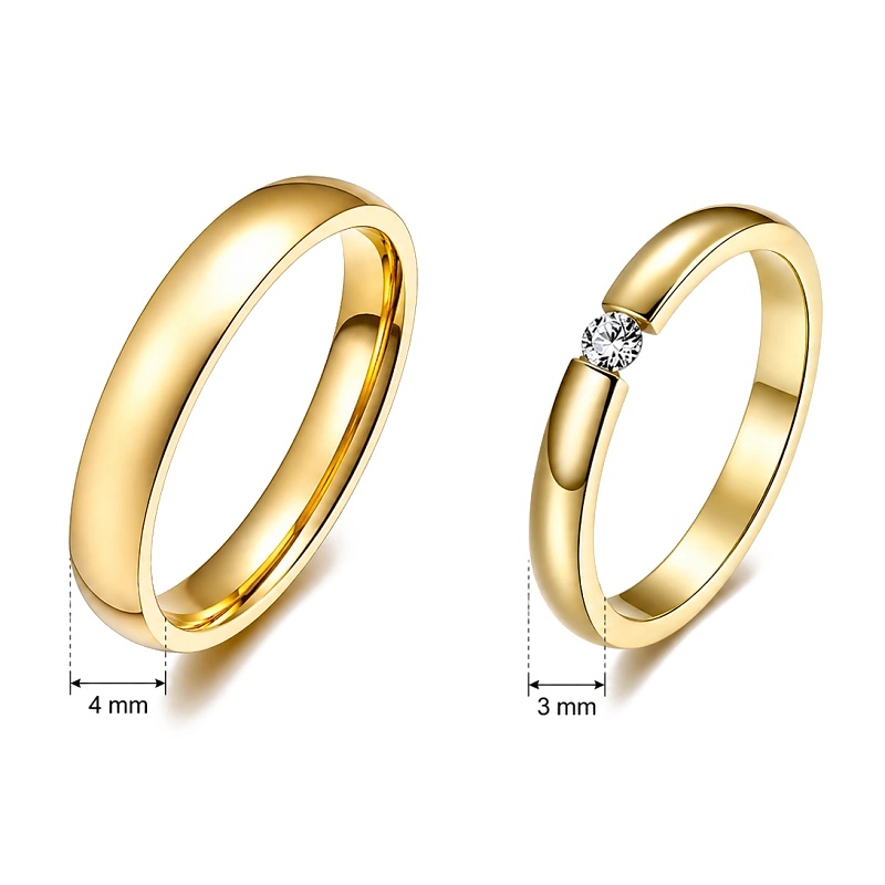 ALIANZAS ACERO Y TUNGSTENO CON ORO AMARILLO MODELO "AIRE"