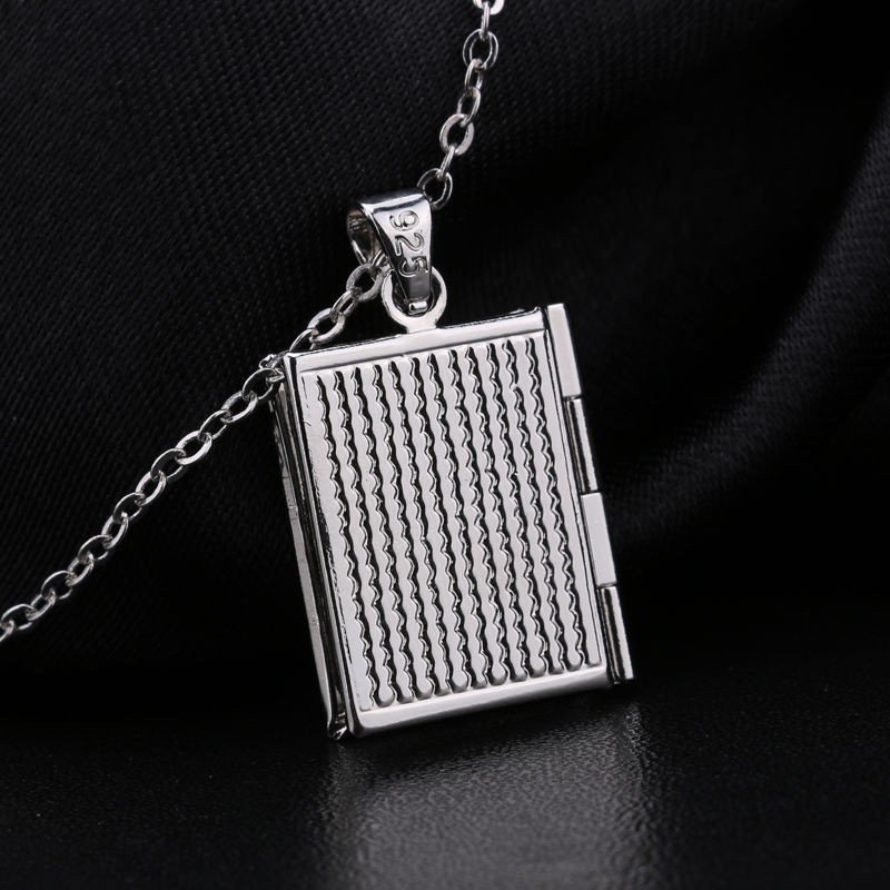 COLGANTE RELICARIO PORTAFOTOS LIBRO CON PLATA 925