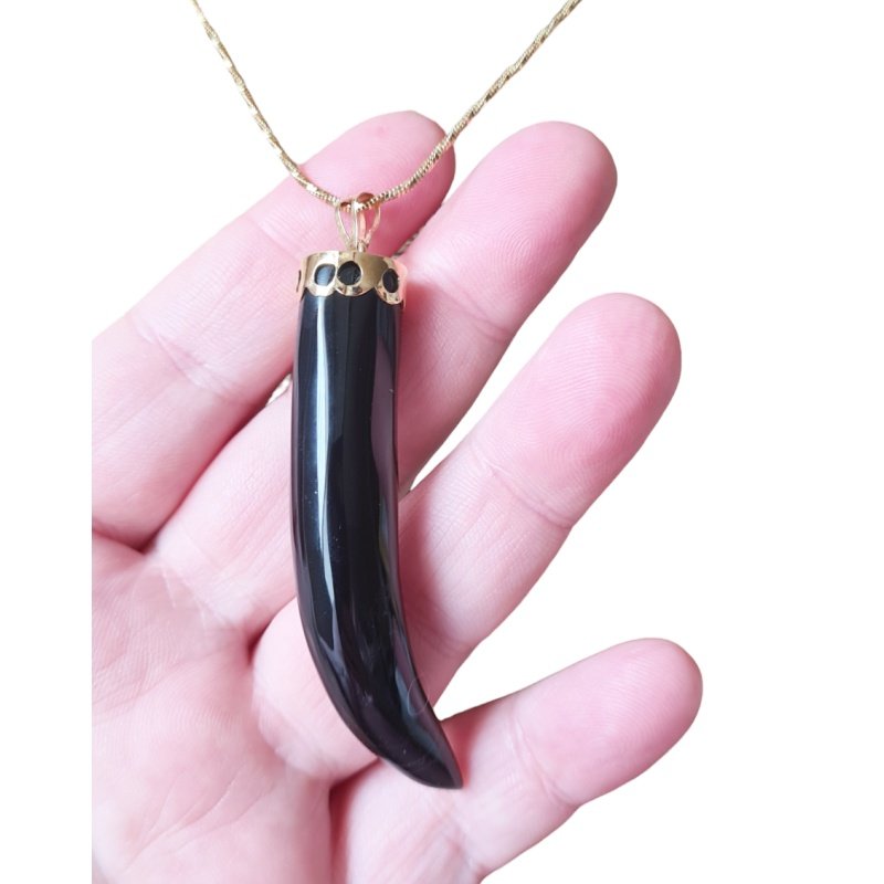 COLGANTE CUERNO ORO DE 1ª LEY 18 KILATES Y ONIX