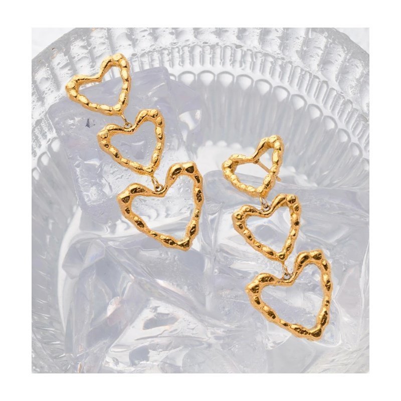 PENDIENTES LARGOS CORAZONES ACERO Y ORO WATERPROOF